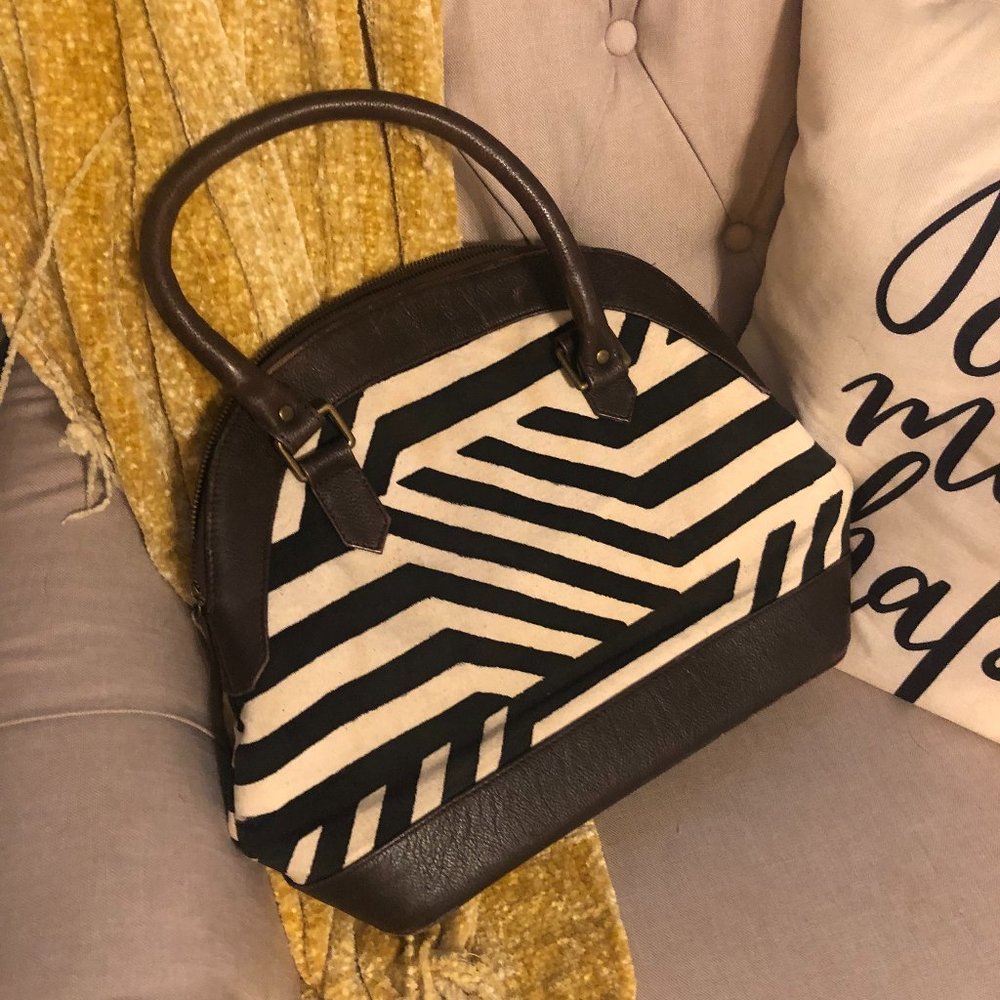 Noonday Zebra print handbag